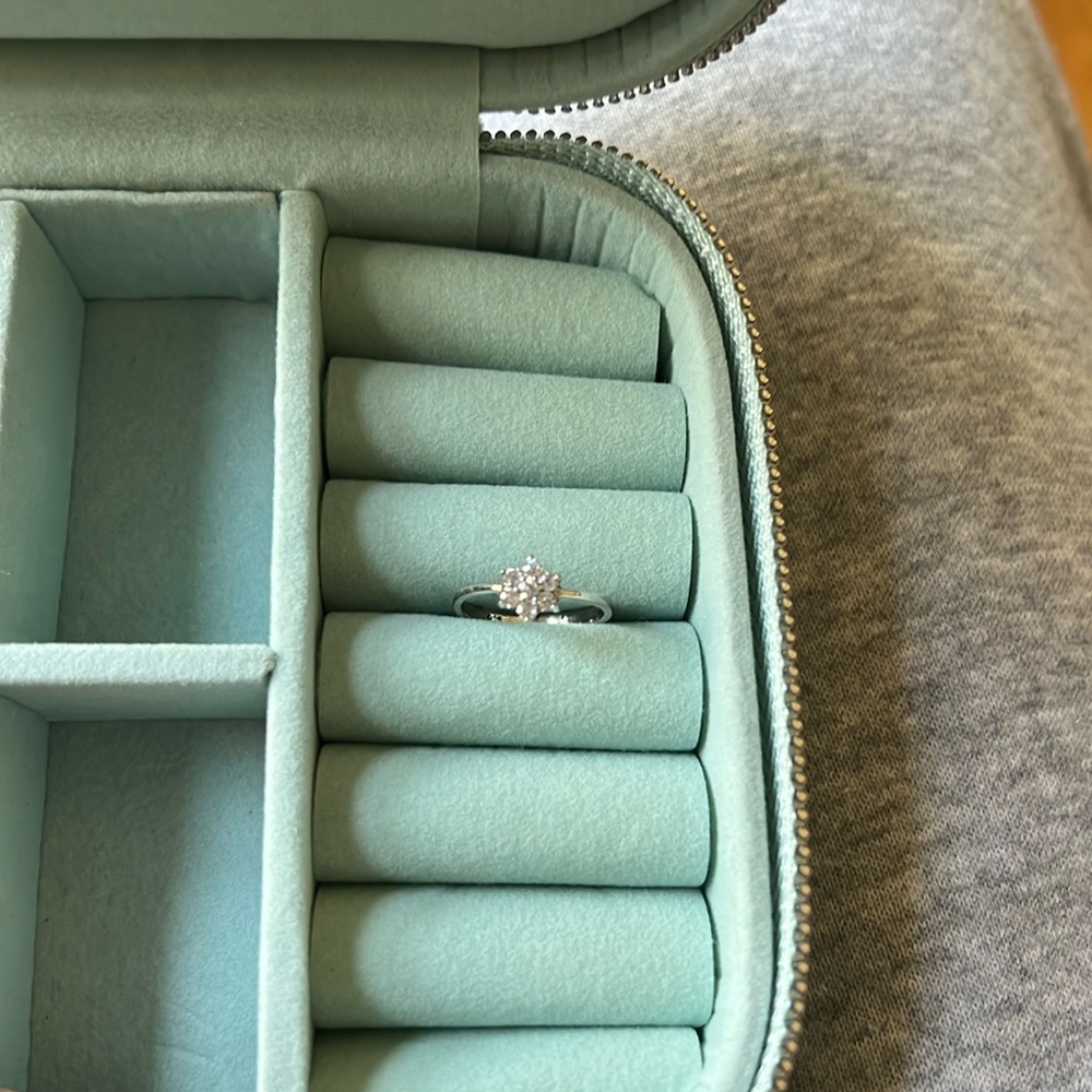 925 sterling, coz stones. Pinky ring.